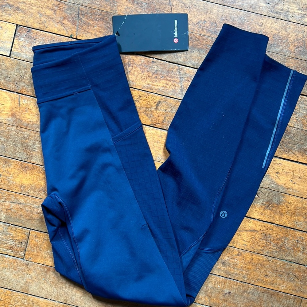 Lululemon mens XS surge warm tight. 29” length